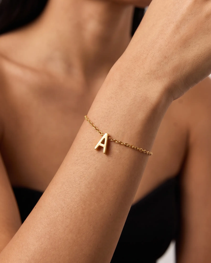 studio-ai bracelet-fine-initial-charm-bracelet_lifestyle1_a1+solo.png