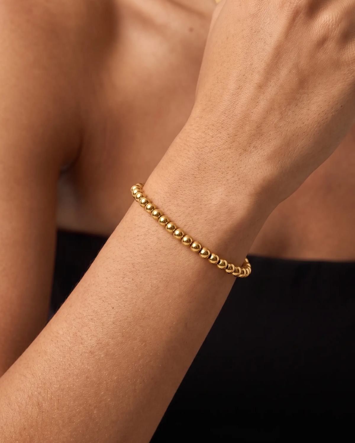 studio-ai bracelet-gold-bead-bracelet_studio2_a1+solo.png