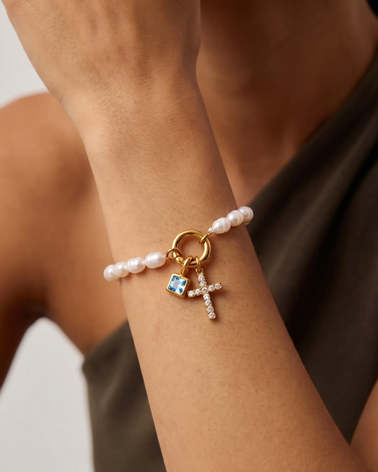 studio-ai bracelet-pearl-and-birthstone-cross-bracelet_studio1_a1+solo.png