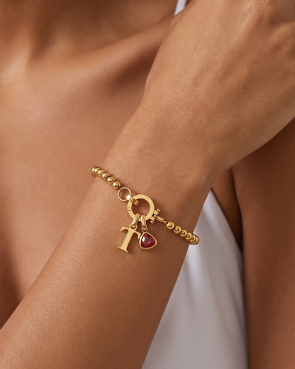 studio-ai bracelet-pebble-birthstone-initial-bracelet_studio1_a1+solo.png