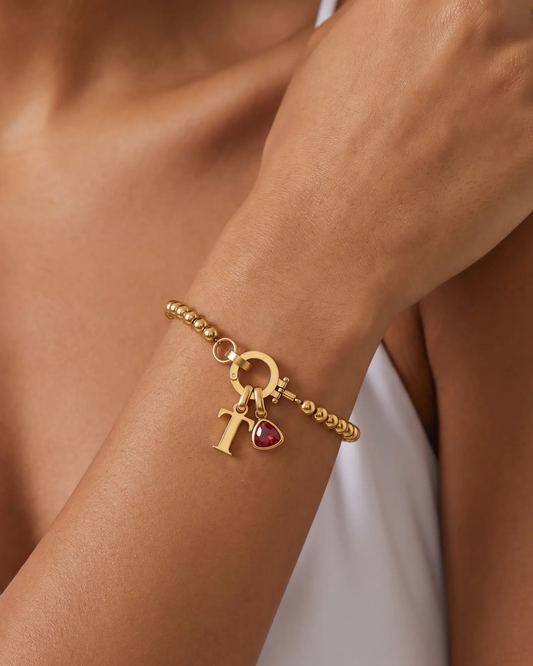 studio-ai bracelet-pebble-birthstone-initial-bracelet_studio1_a1+solo.png
