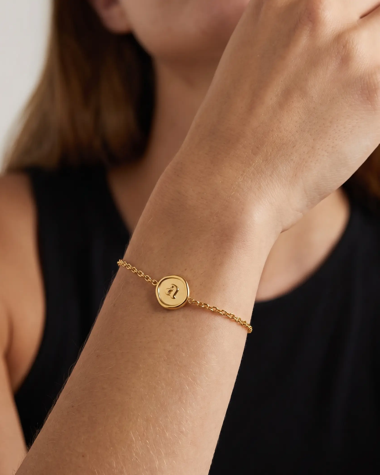 studio-ai bracelet-stamped-initial-bracelet_studio2_a1+solo.png