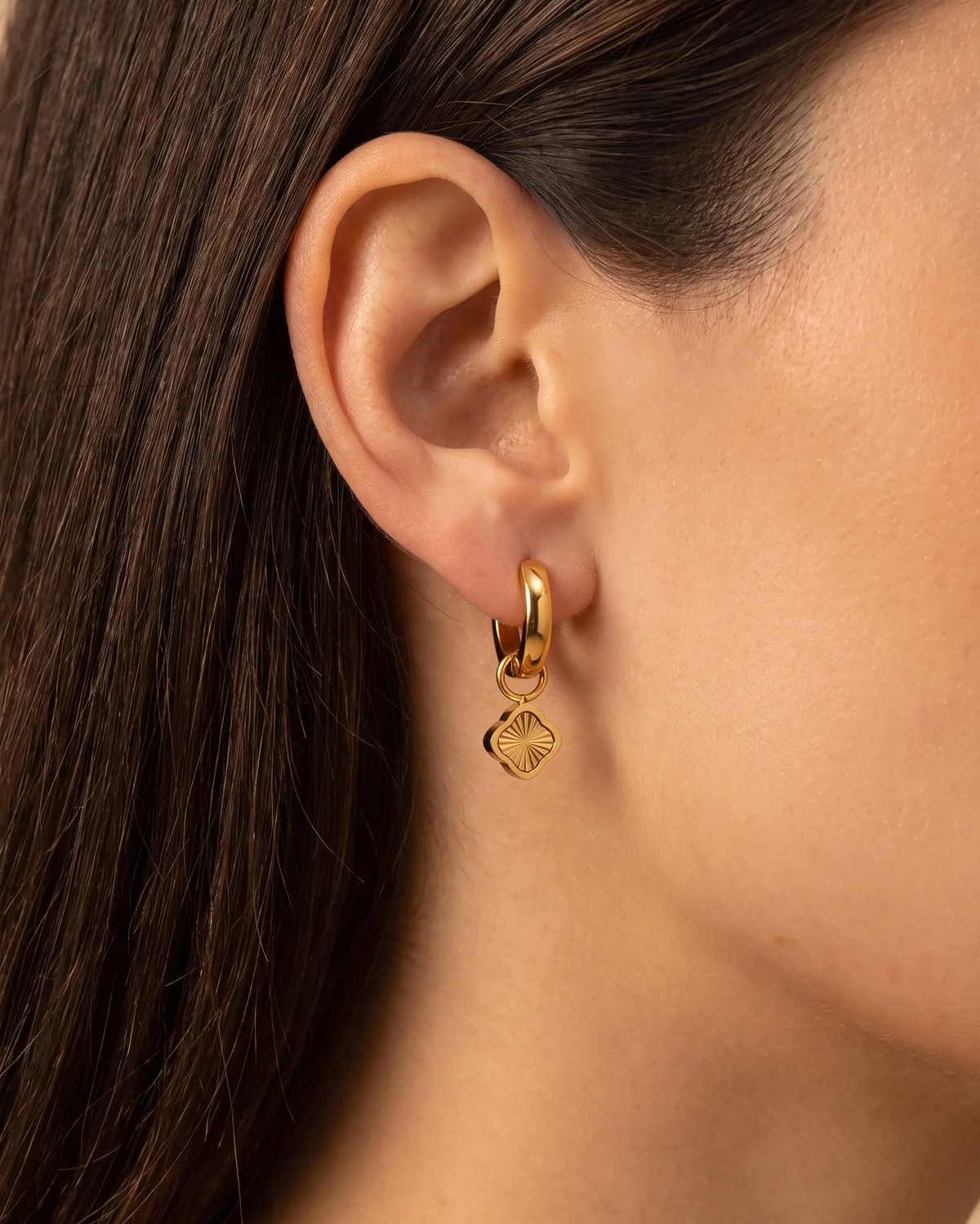 studio-ai earrings-mini-ray-petal-hoops_lifestyle1_a1+solo.png