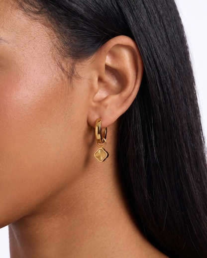 studio-ai earrings-mini-ray-petal-hoops_studio1_a1+solo.png