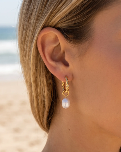 studio-ai earrings-mini-twist-pearl-hoops_studio1_a1+solo.png