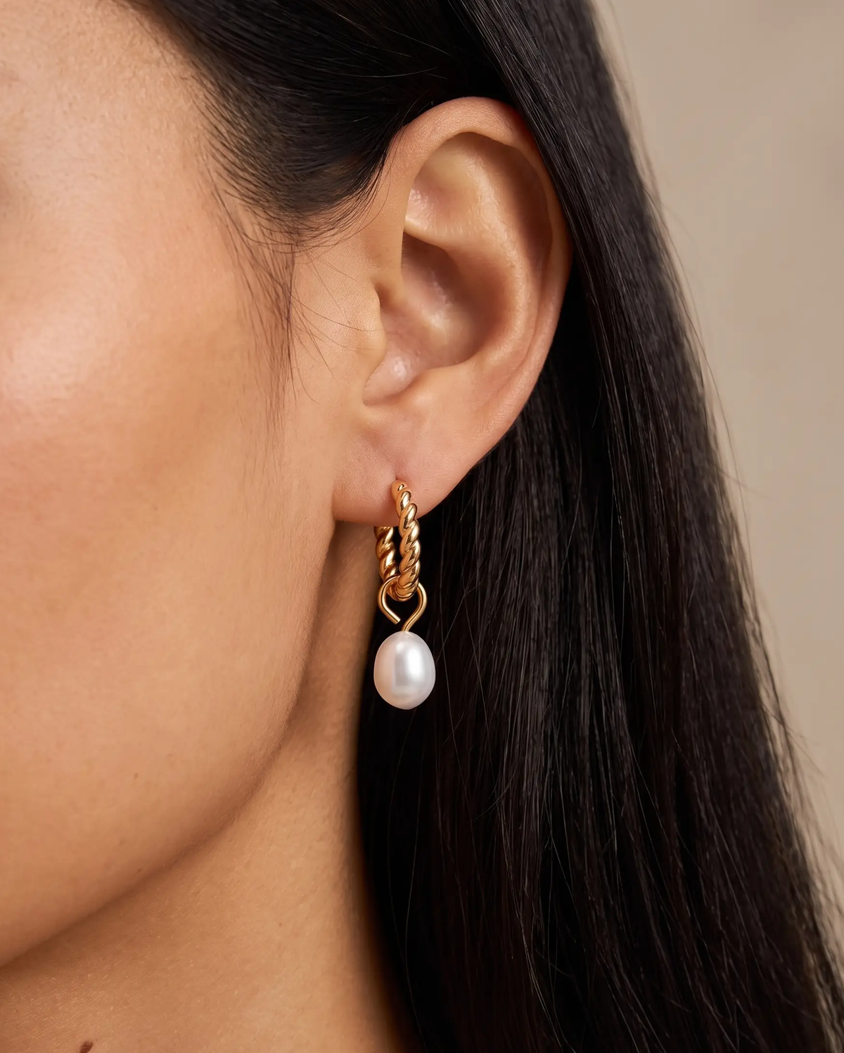 studio-ai earrings-mini-twist-pearl-hoops_studio2_a1+solo.png