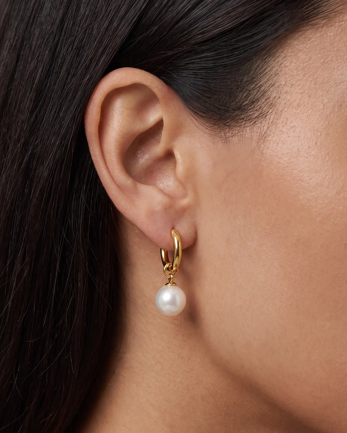 studio-ai earrings-pearl-teardrop-earrings_lifestyle1_a1+solo.png