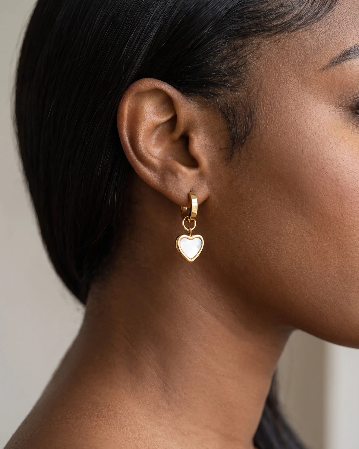studio-ai earrings-selma-heart-huggies_studio2_a2+solo.png