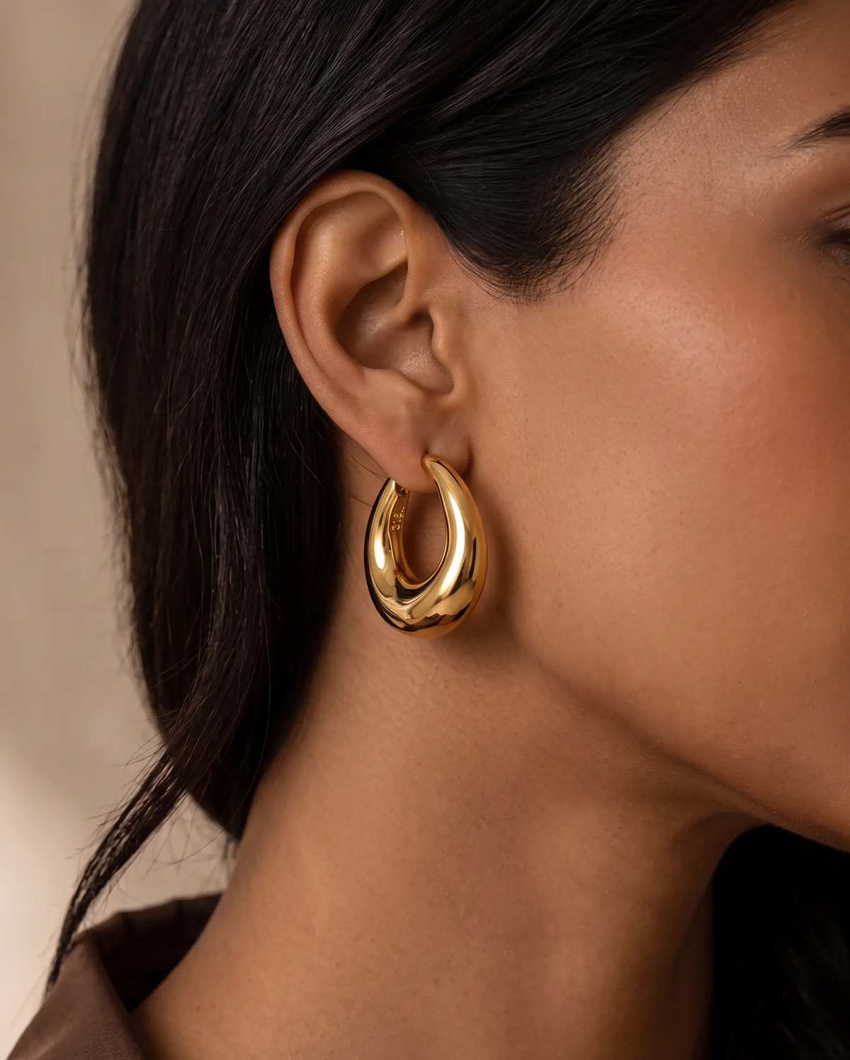 studio-ai earrings-shaped-loop-earrings_lifestyle1_a2+solo.png