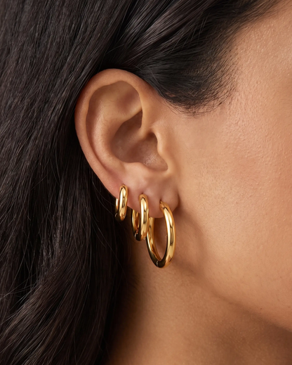 studio-ai earrings-simple-gold-hoop-set_lifestyle1_a1+solo.png