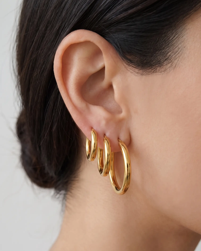 studio-ai earrings-simple-gold-hoop-set_studio1_a1+solo.png