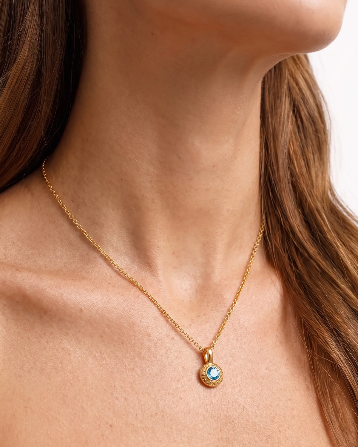 studio-ai necklace-facet-birthstone-pendant-necklace_lifestyle1_a1+solo.png