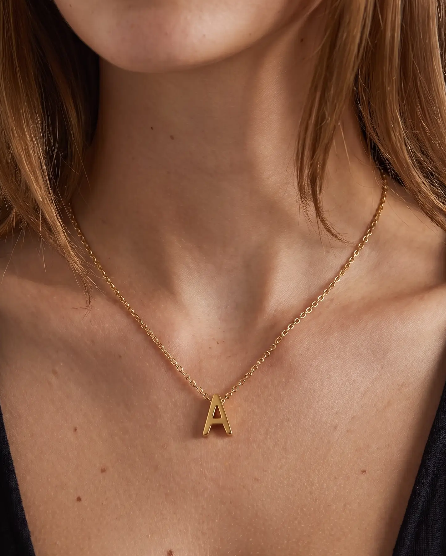 studio-ai necklace-fine-initial-charm-necklace_lifestyle1_a1+solo.png