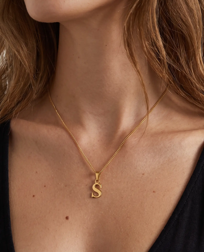 studio-ai necklace-gold-letter-charm-necklace_studio2_a1+solo.png