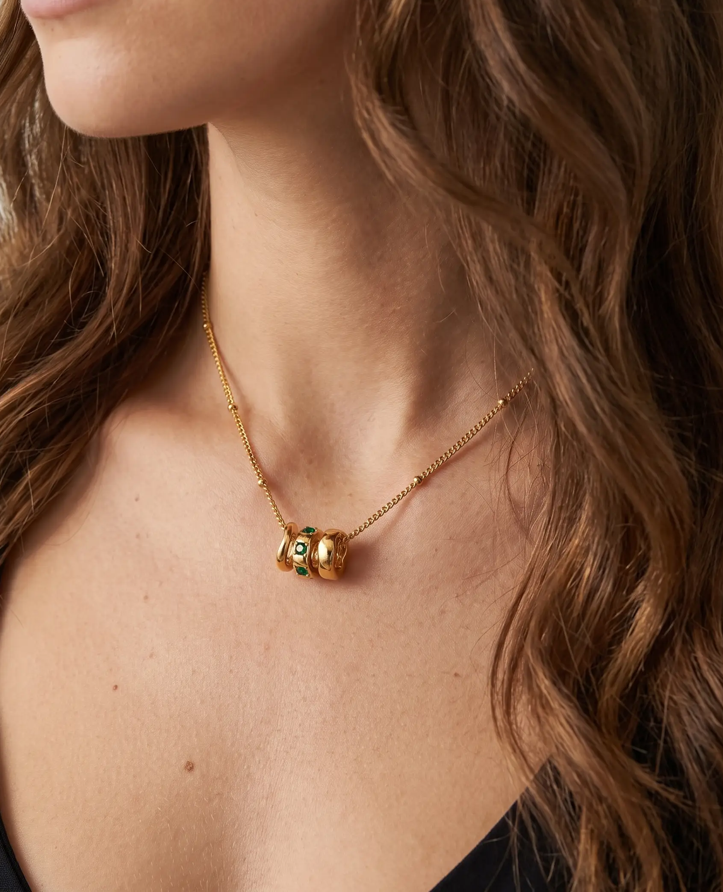 studio-ai necklace-juna-trio-pendant-necklace_lifestyle1_a1+solo.png