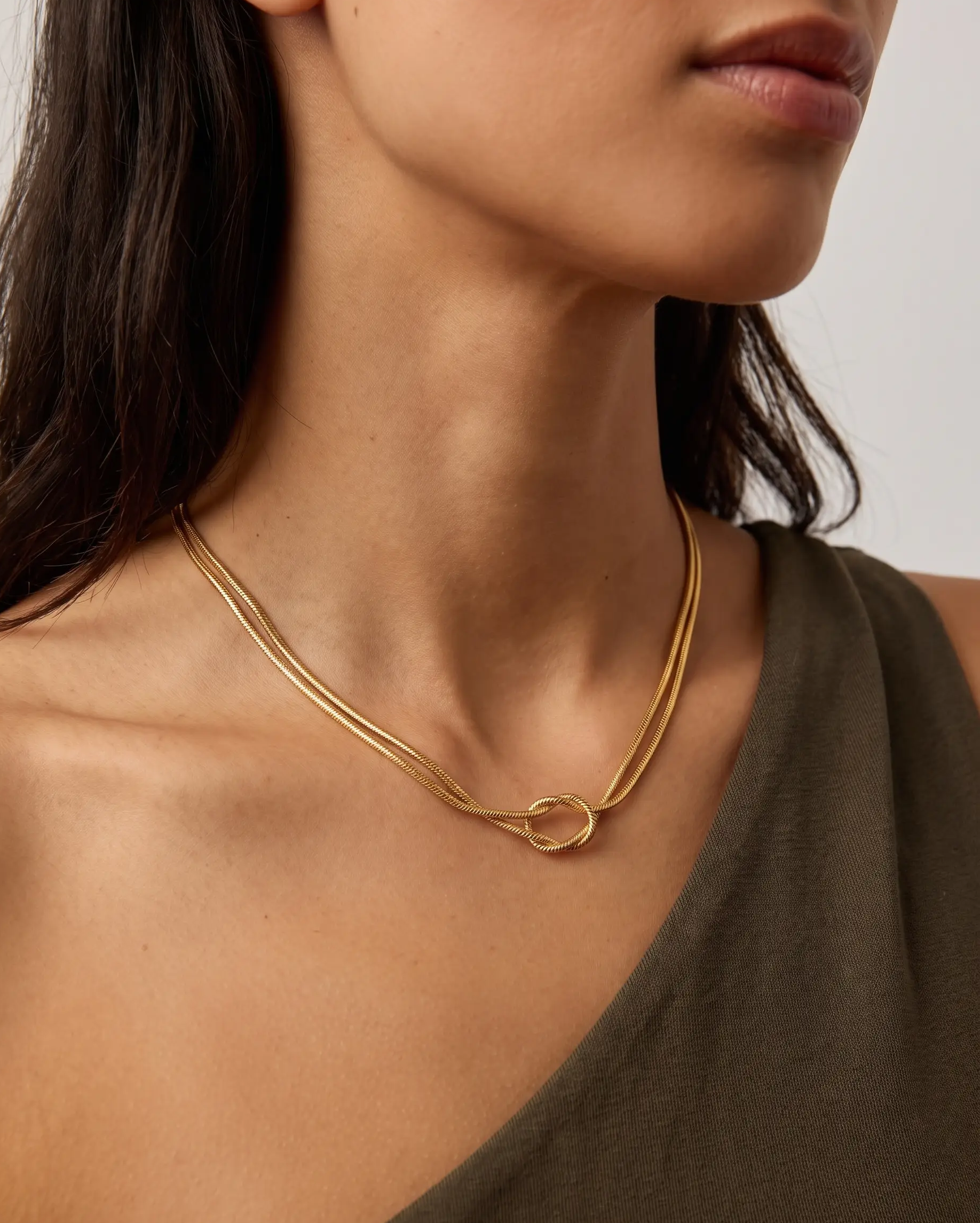 studio-ai necklace-loop-knot-necklace_studio2_a1+solo.png