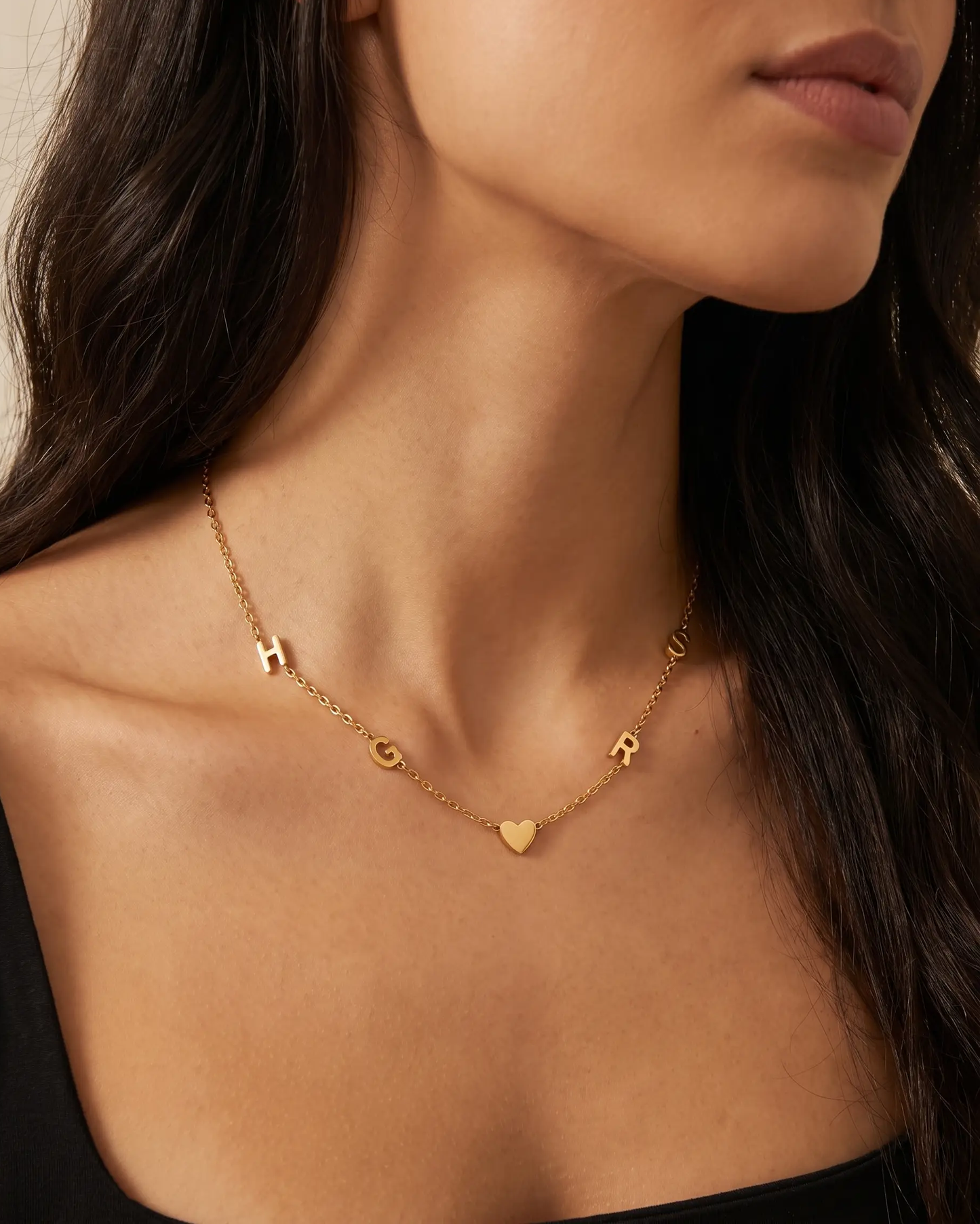 studio-ai necklace-multi-letter-necklace_lifestyle1_a1+solo.png
