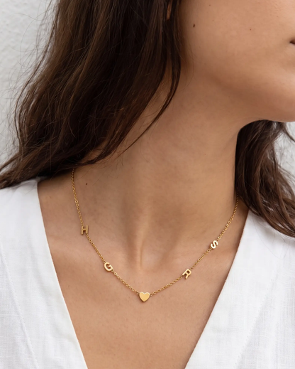 studio-ai necklace-multi-letter-necklace_studio2_a1+solo.png