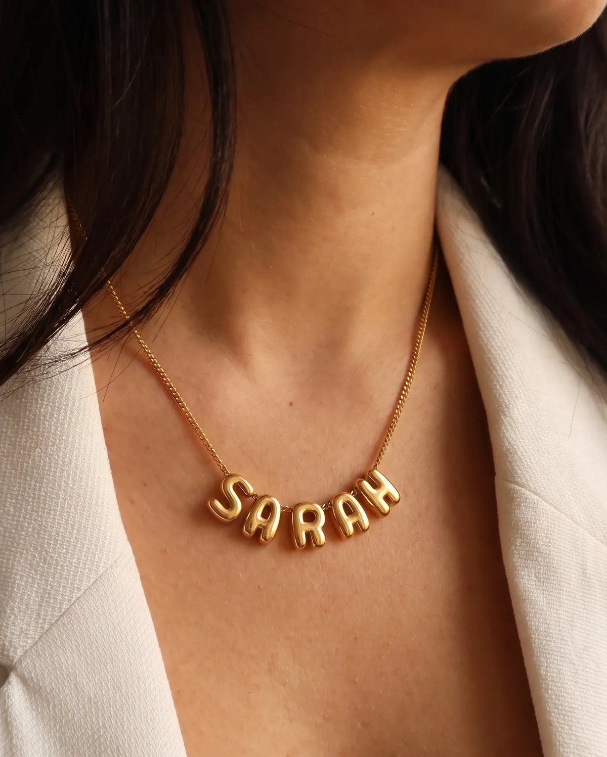 studio-ai necklace-puff-name-necklace_studio1_a1+solo.png