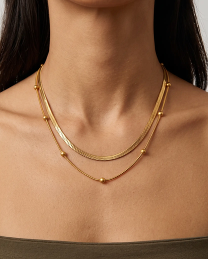 studio-ai necklace-snake-and-satellite-layered-necklace_studio1_a1+solo.png