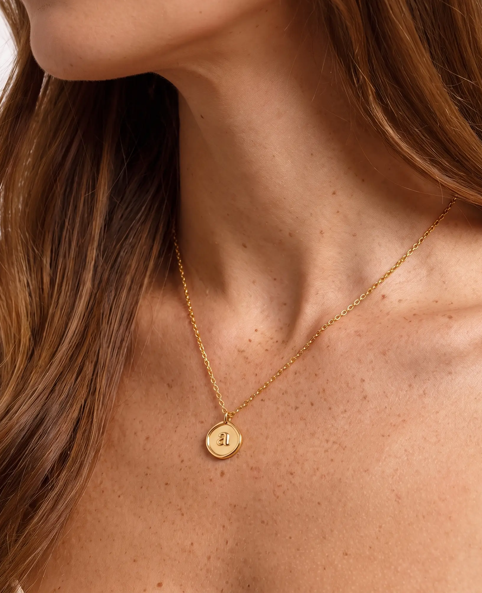 studio-ai necklace-stamped-initial-necklace_studio2_a1+solo.png