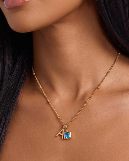 studio-ai necklace-stone-initial-necklace_lifestyle1_a1+solo.png
