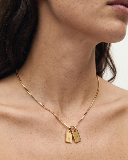 studio-ai necklace-tag-letter-necklace_lifestyle1_a1+solo.png