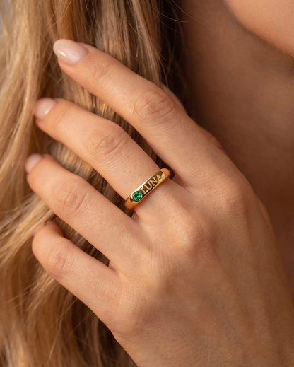 studio-ai ring-engraved-birthstone-name-ring_studio1_a1+solo.png
