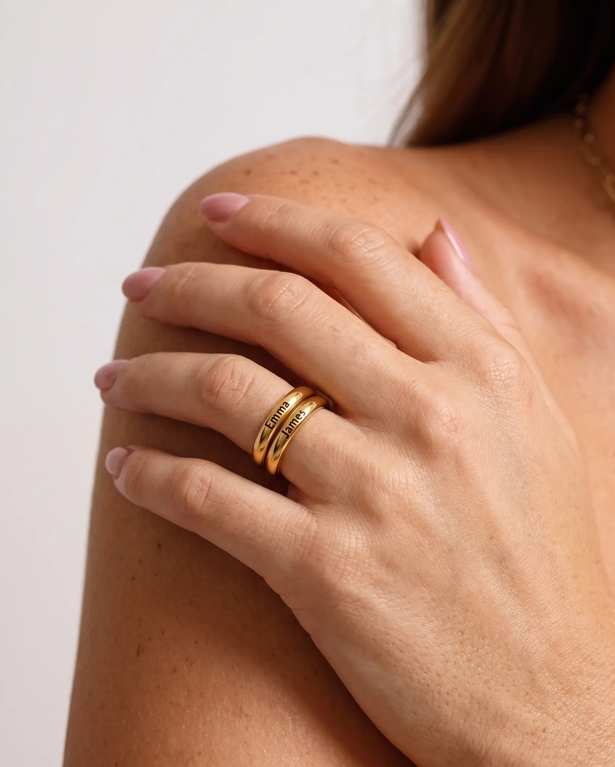 studio-ai ring-fine-stacking-name-ring_lifestyle1_a3+solo.png