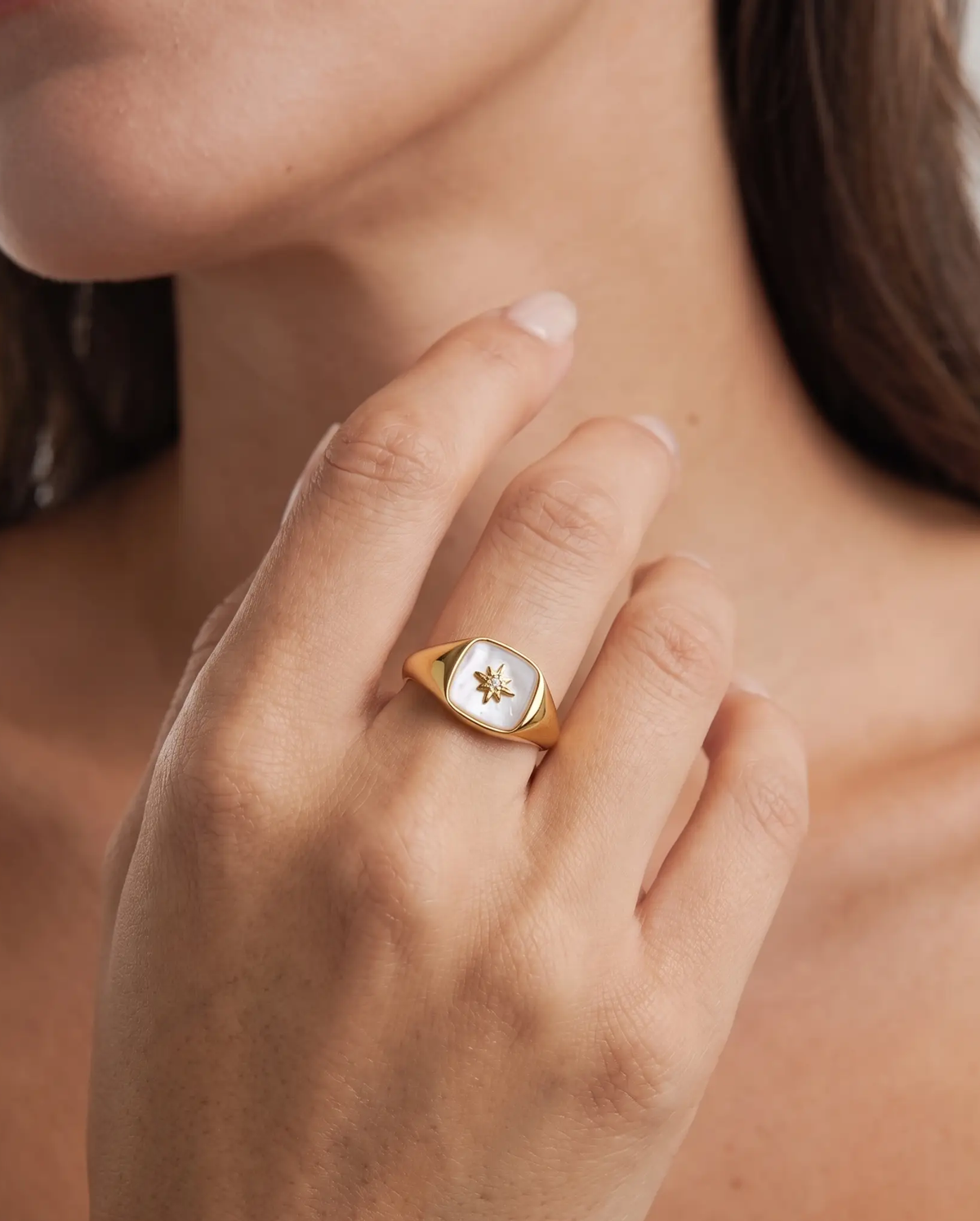 studio-ai ring-nacre-star-signet-ring_lifestyle1_a1+solo.png