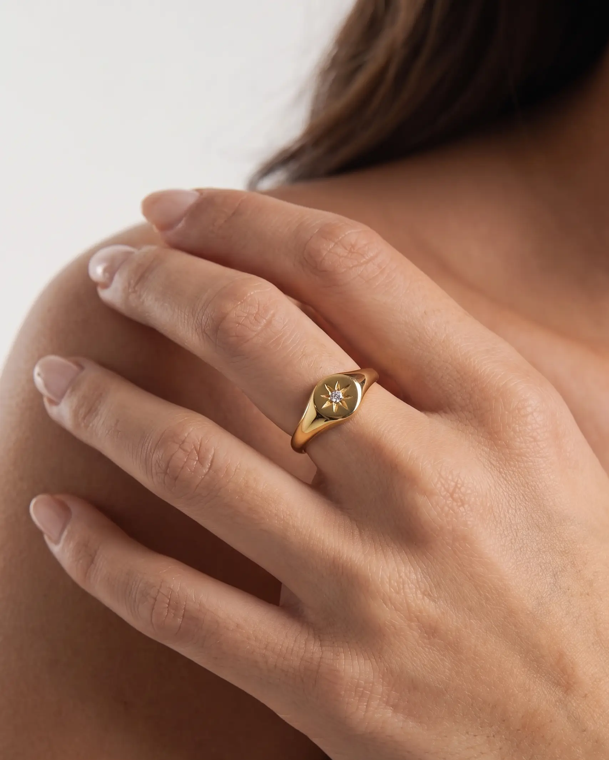 studio-ai ring-vega-signet-ring_lifestyle1_a1+solo.png